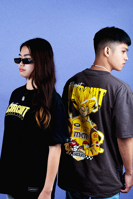 Models wearing Saiyan M&M t-shirts